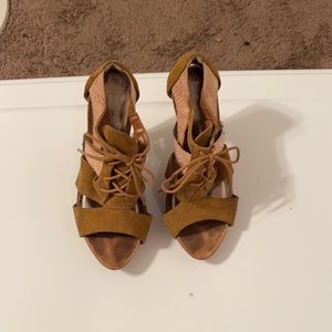 Size 8.5 brown wedge fairly worn been in closest a while